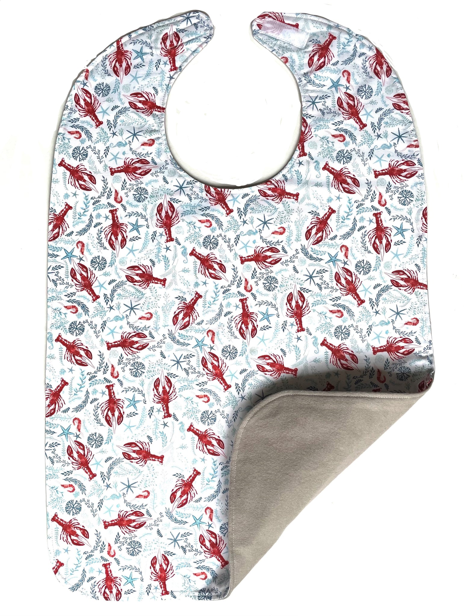 The perfect lobster bib with three layers of 100% premium cotton and expertly designed for comfort and quality.