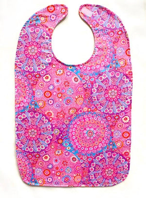 BAVETTE adult bib with abstract pink swirls on three layers of machine washable premium cotton, Velcro back closure, 26" x 17" 