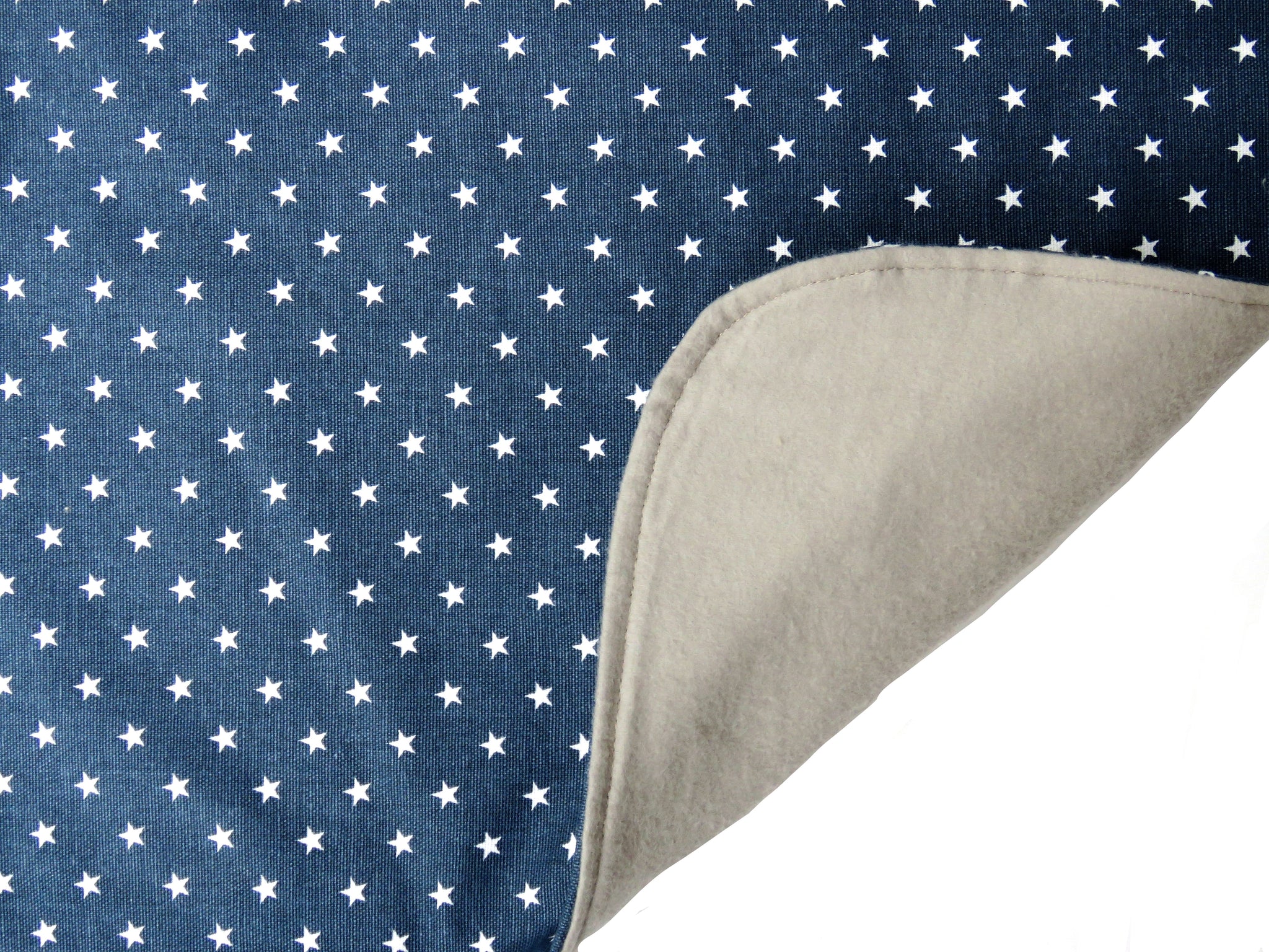 Denim Star is one of our favorite BAVETTE adult bib designs for men and women. Classic blue denim with tiny white stars make a patriotic statement in a stylish, washable, 100% premium cotton dining bib and clothing protector for seniors and adults with special needs.
