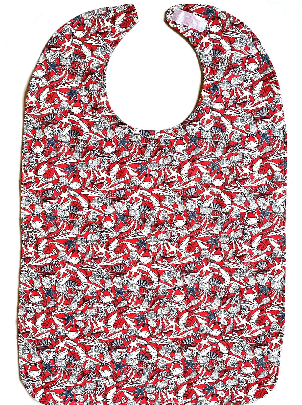 BAVETTE adult bib with white starfish, shrimp and shells on coral background on three layers of machine washable premium cotton, Velcro back closure, 26" x 17" 